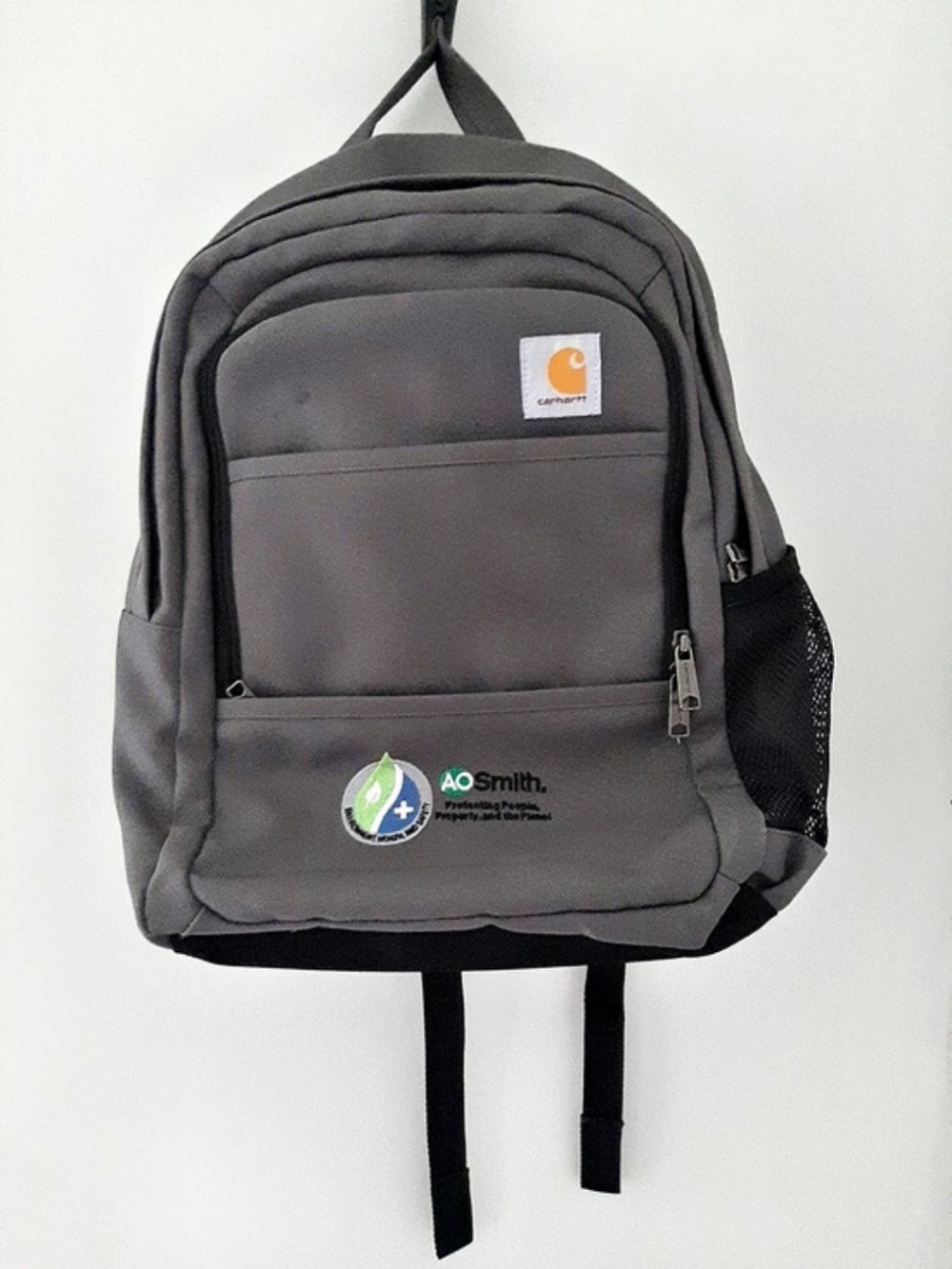Carhartt Gray Backpack With AO Smith corporate logo